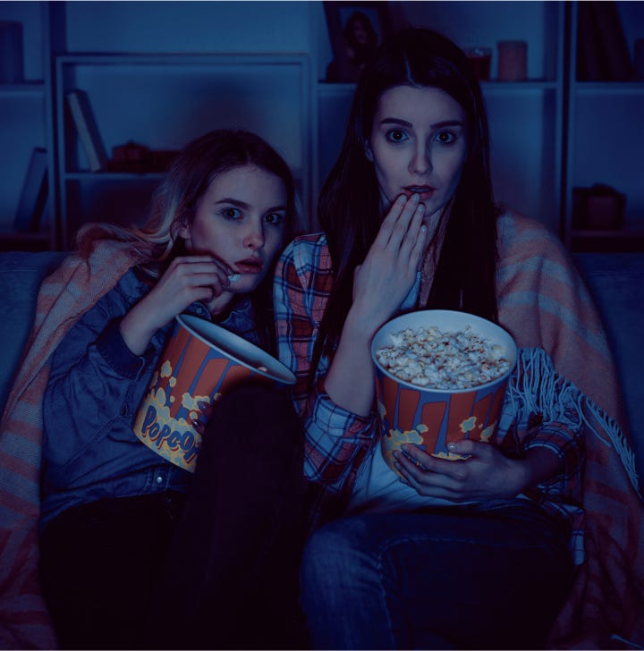 Woman Eating Popcorn